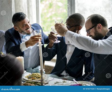 People Holding Their Champagne Glasses For A Toast At A Wedding Table Stock Image Image Of