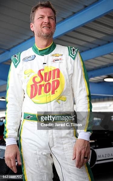 Hall Of Famer Dale Earnhardt Jr Stands In The Garage Area During The