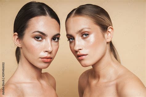 Women Posing Naked Isolated Over Beige Wall Background Stock Photo Adobe Stock