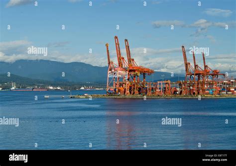 Loading Cranes For Container Ships At The Port Of Vancouver On Burrard