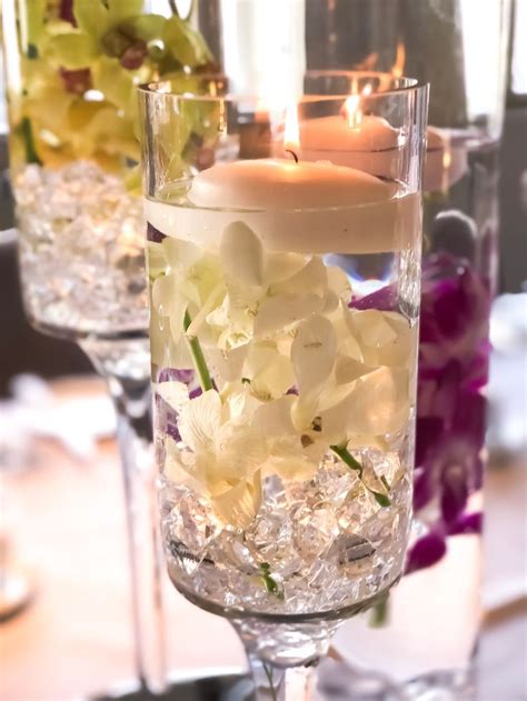 Suspended Orchid Centrepiece In Water With Floating Candle Floating