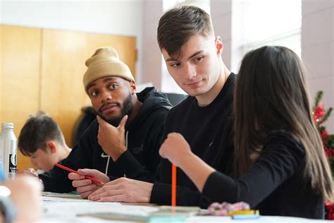 Loyal fans cheer at nuggets stadium for the home team 33