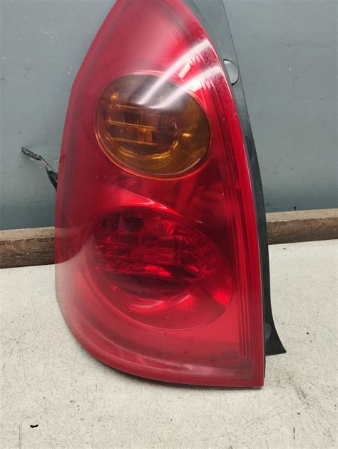 LAMPA LEWA TYLNA LEWY TYŁ NISSAN PRIMERA P12 KOMBI EUROPA LAMPA LEWY