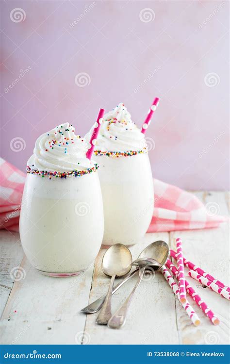 Vanilla Milkshake With Whipped Cream And Sprinkles