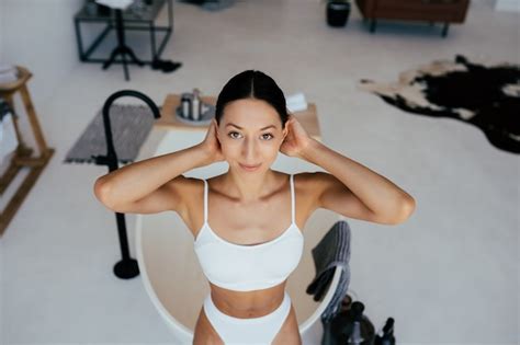 Free Photo Attractive Woman In Lingerie Posing Near The Bath