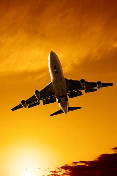 Landing Airplane Boeing 747 Sunset Stock Photos Pictures And Royalty