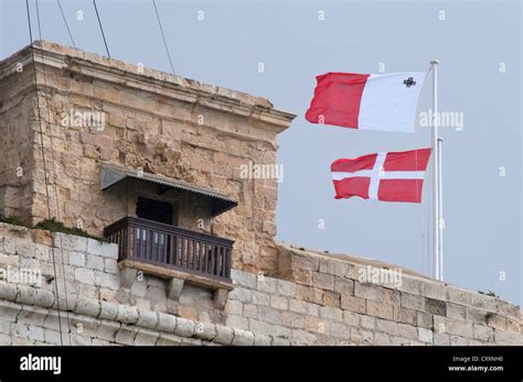 Maltese Flags Fly Above Fort St Angelo Vittoriosa Malta Stock Photo