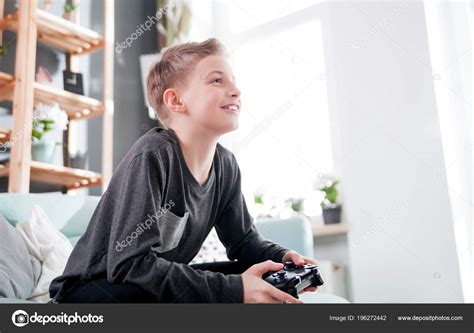 Excited Young Boy Playing Game Console Home Stock Photo By