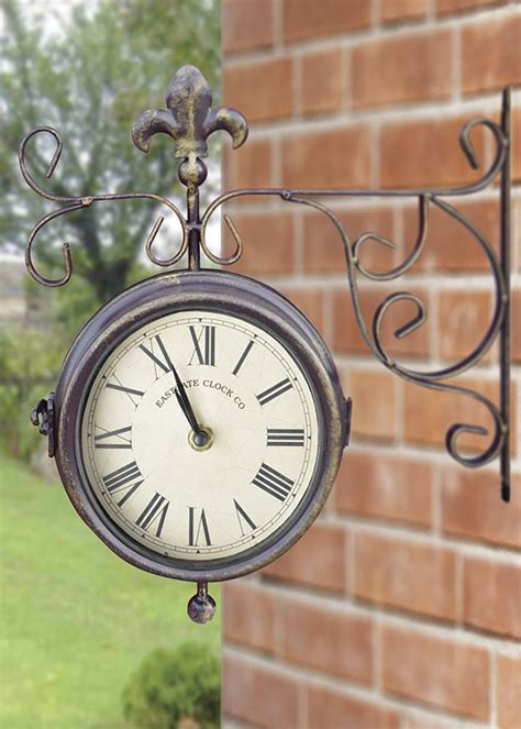 Купить уличные часы двухсторонние TF005 Esschert Design – Consta Garden ...