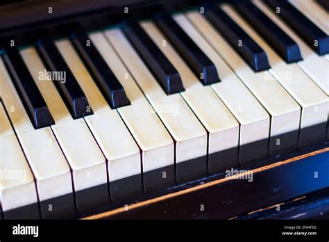 Piano Keyboard Black And White Key Close Up And Macro Retro And Vintage Piano Music