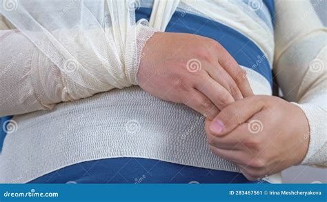 Man Tries To Move Fingers of Injured Hand Wrapped with Bandage Stock Video - Video of bandage ...