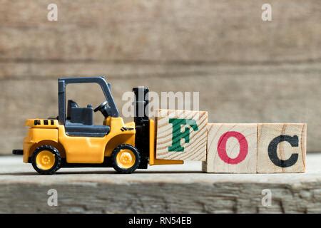 Toy Yellow Forklift Hold Letter Block M To Complete Word Moq