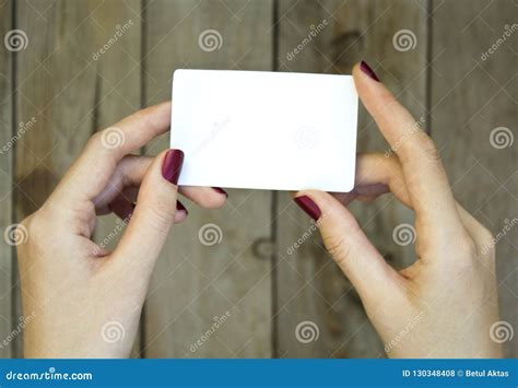 Woman Hand Holding Blank Card On Wooden Table Stock Photo Image Of