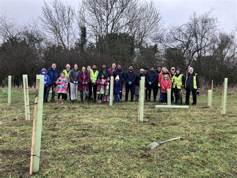 Residents plant 700 new trees to create new woodland in their area of