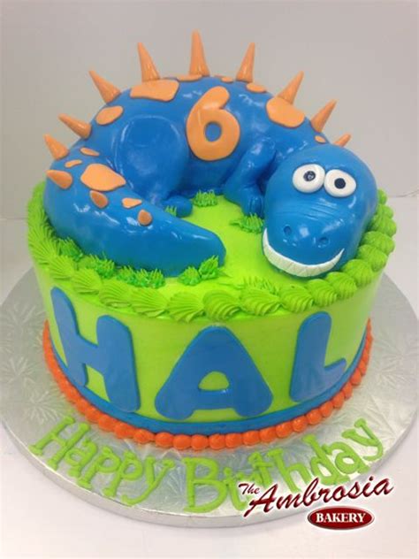 Smiling Dinosaur Cake The Ambrosia Bakery Cake Designs Baton Rouge