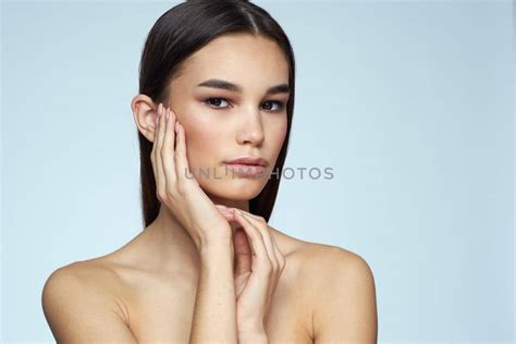 Woman With Naked Shoulders Long Hair Clean Skin Cropped View Blue Background Royalty Free Stock