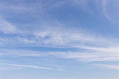 Transparent blue sky with clouds and atmospheric afternoon. 16801466 ...