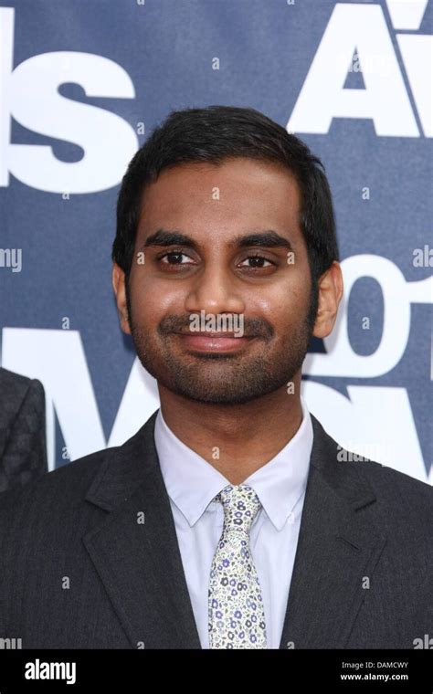 Actor Aziz Ansari arrives at the MTV Movie Awards at Universal Studio's ...