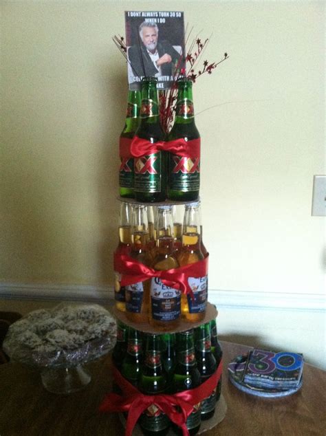 Beer bottle cake tower! Dos Equis and Corona bottles, red ribbon ...