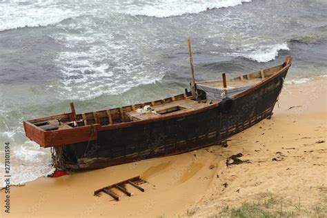 Korean Fishing Boat Wreck On Sandy Sea Beach After The Storm Broken