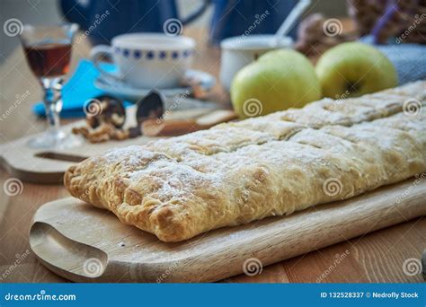 Apple Strudel with Nuts, Raisins, Cinnamon and Powdered Sugar. Homemade ...