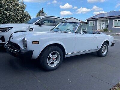 Fiat 124 Spider cs 1 Oldtimer weiß mit schwarzem Verdeck eBay