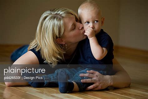 Mother Kissing Her Son Stock Image Everypixel