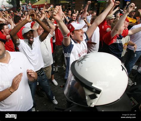 England fans are separated from German in Cologne, Germany, as the ...