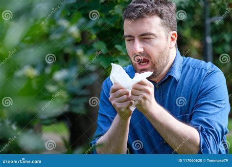 Adult Caucasian Man Sneezes because of an Allergy. Stock Photo - Image ...