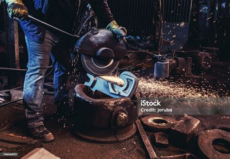 Worker Cut Metal With Angle Grinder Stock Photo - Download Image Now ...