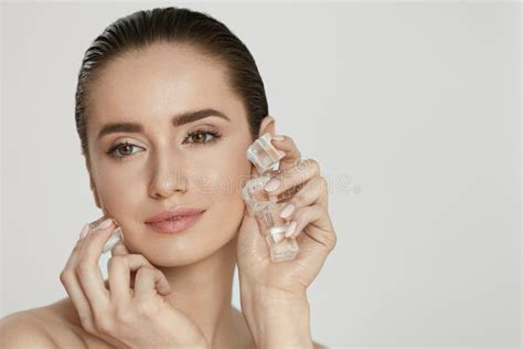 Skin Beauty Care Woman Using Ice For Face Spa Treatment Stock Image