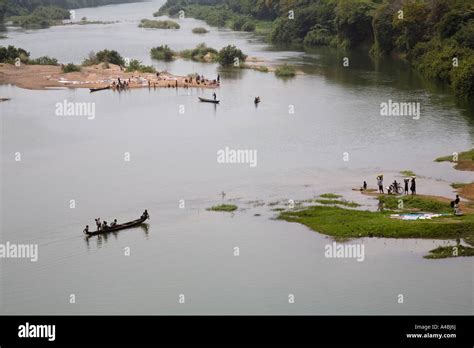 Washday and ferry beside the Black Volta river northern Ghana Stock ...