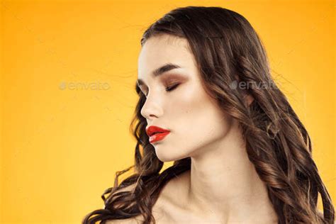 Beautiful Brunette Naked Shoulders Bright Makeup Red Lips Hairstyle Close Up Yellow Background