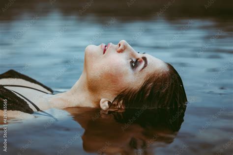 Face Girl Lying In The Water Stock Photo Adobe Stock