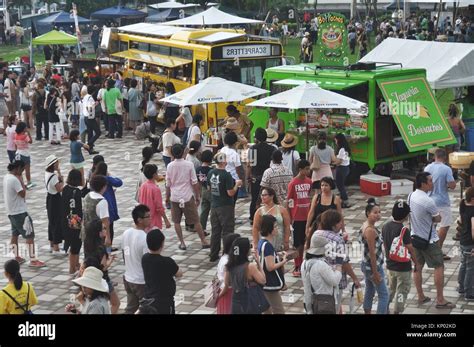 Naha, Okinawa, Japan: people at the Food Flea Market in Tomarin Stock Photo - Alamy