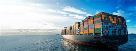 Stern Of Large Cargo Ship Import Export Container Box On The Ocean Sea