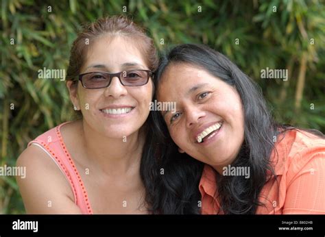Two Middle Aged Latina Sisters Stock Photo Alamy