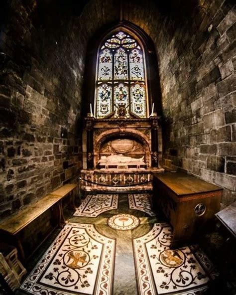 The Inside Of An Old Church With Stained Glass Window And Bench In It S