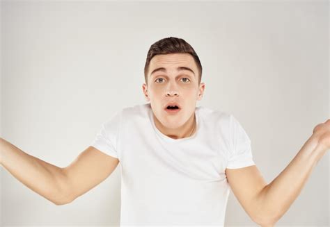 Premium Photo Portrait Of Mid Adult Man Standing Against White Background