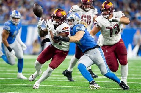 Watch the Detroit Lions' locker room celebration while chanting Dan ...