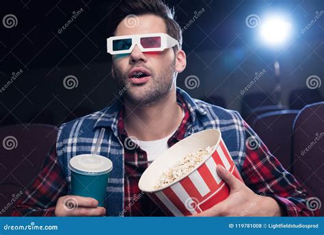 Emotional Handsome Man In 3d Glasses With Popcorn And Soda Watching