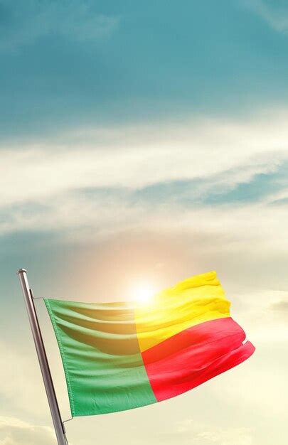 Premium Photo Benin National Flag Waving In Beautiful Sky