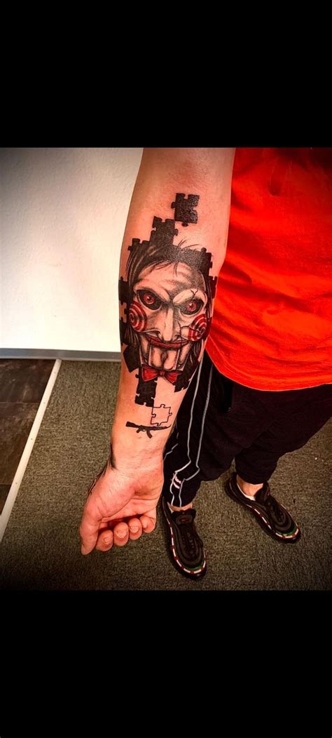 Jigsaw Tattoo | Jigsaw tattoo, Movie tattoos, Horror tattoo