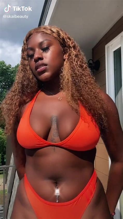 Hot Skaibeauty Shows Cleavage In Orange Bikini Sexyfilter