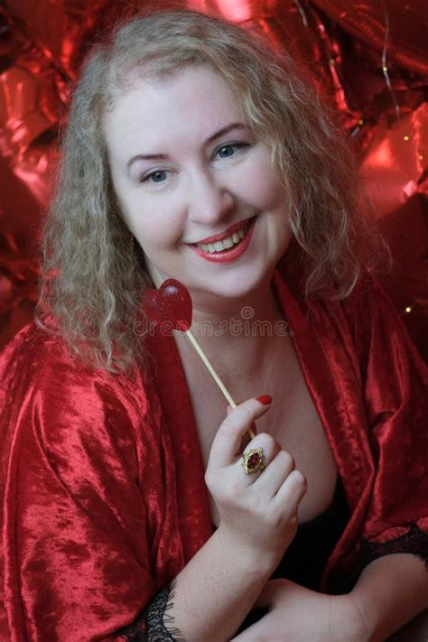 An Older Pretty Blonde Curly Woman Stock Photo Image Of Aged Lady