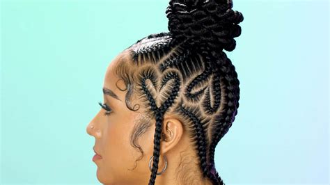 Download A Woman With Braids In Her Hair | Wallpapers.com