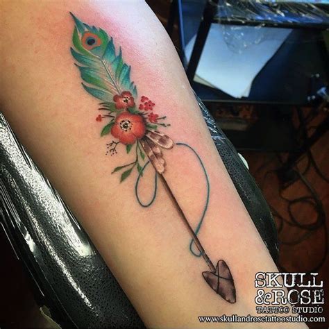 45 Awesome Feather Tattoo Ideas Feather Tattoos Arrow Tattoos