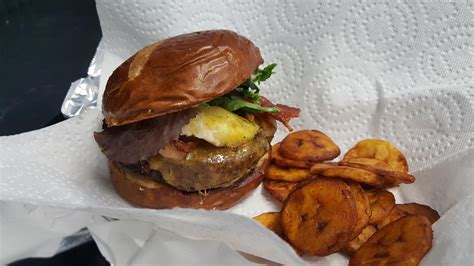 Homemade Jamaican Jerk Chicken On Toasted Pretzel Bun W Deep Fried