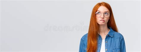 Thoughtful And Curious Cute Redhead Teenage Girl Thinking Biting Lip