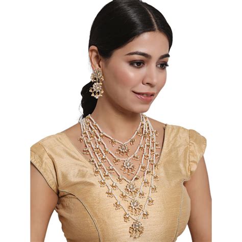 Jazz And Sizzle Gold Plated White Kundan Studded Pearl Beaded